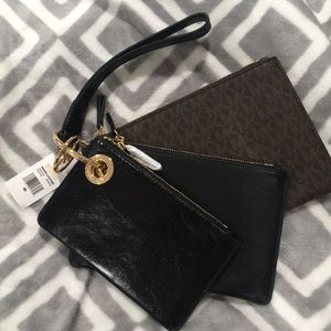 Michae Kors leather clutches